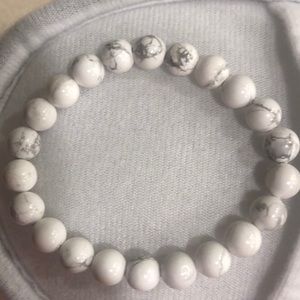 Women’s white marble bracelet.